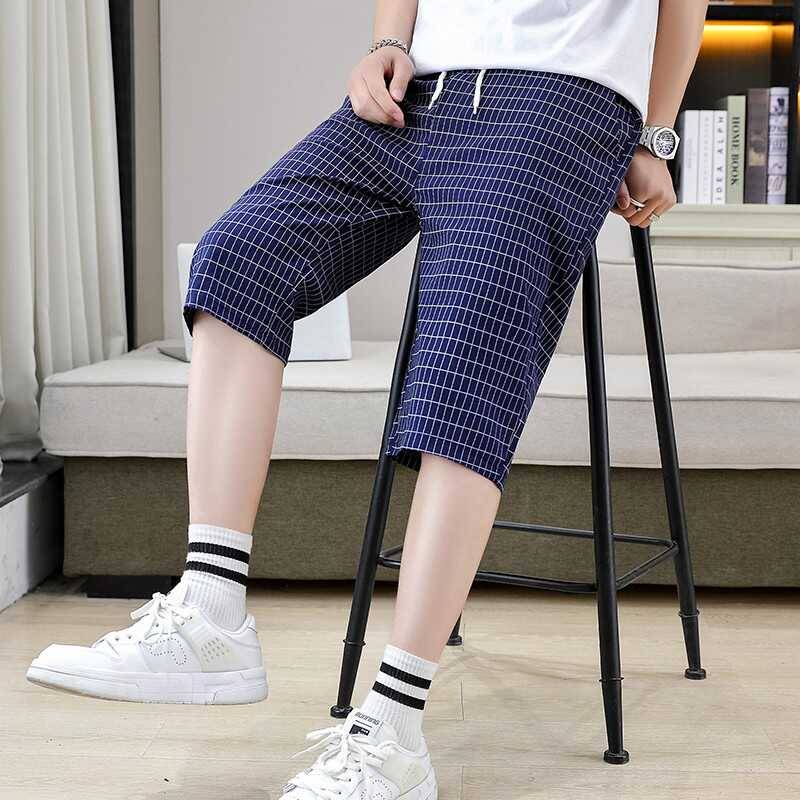 Summer men's cropped pants elastic shorts fashion casual slimming pants trend checkered grid horse pants pork pants men