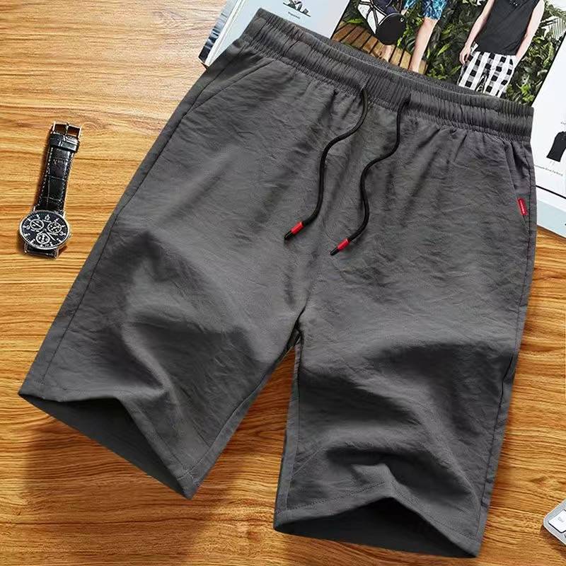 Casual shorts Men's summer breathable five -point ice silk pants wear loose sports horse pants thin beach big pants