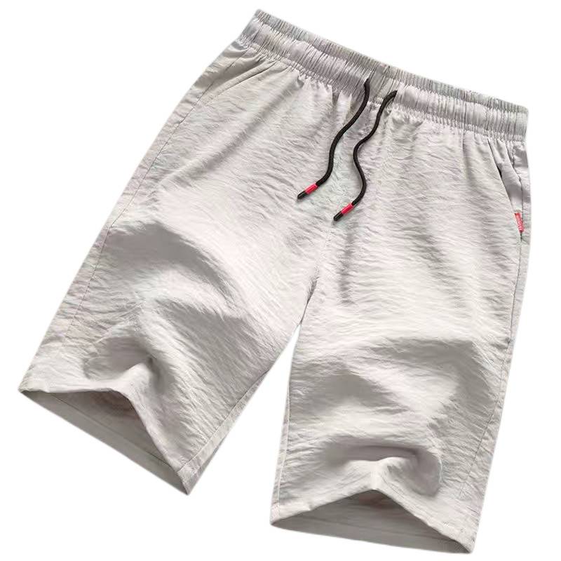 Casual shorts Men's summer breathable five -point ice silk pants wear loose sports horse pants thin beach big pants