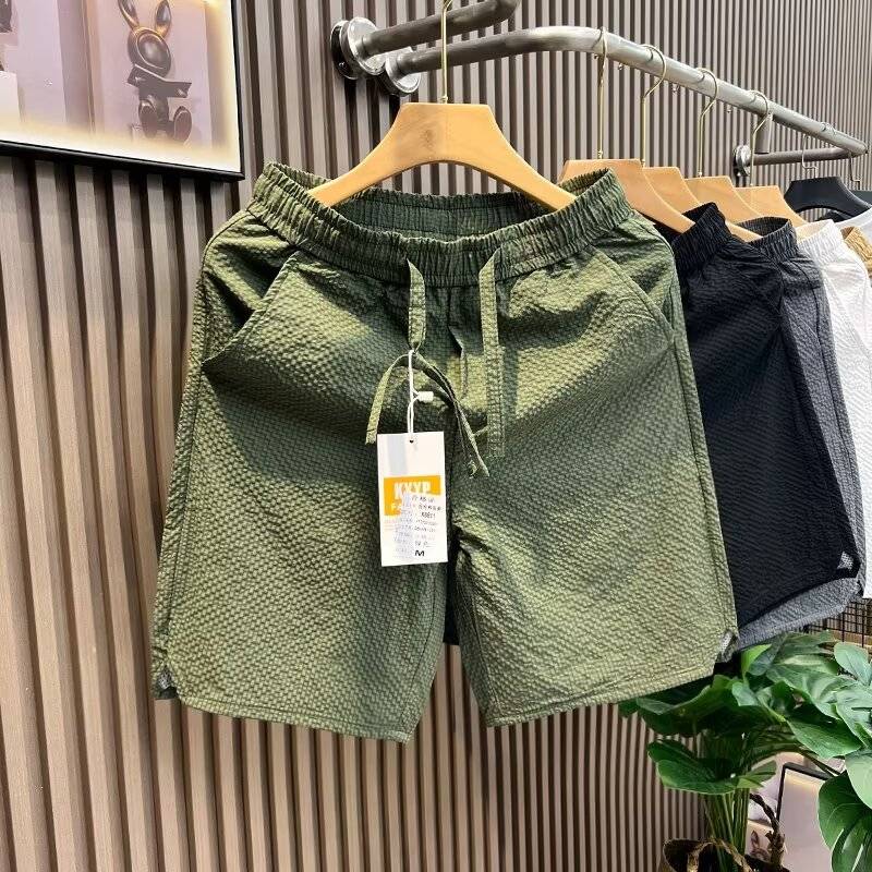 Summer new men's fashion quarter pants bubble gauze casual short pants trend fast dry sand pants sports pants pants