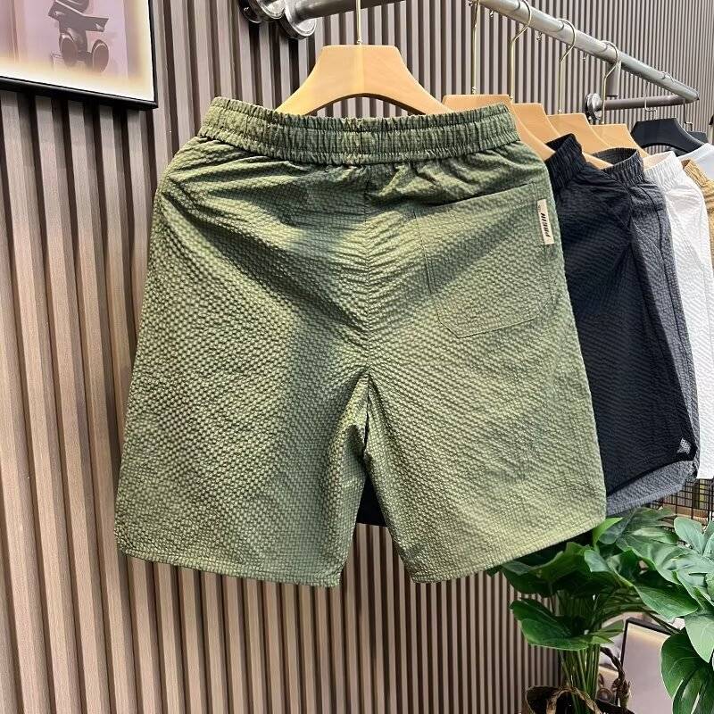 Summer new men's fashion quarter pants bubble gauze casual short pants trend fast dry sand pants sports pants pants