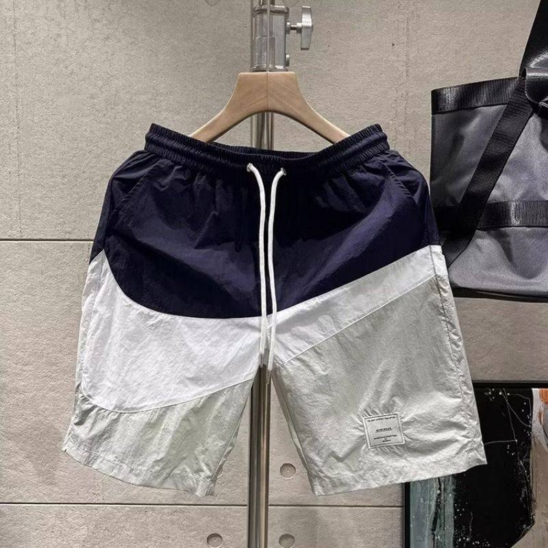 Summer pants pants men's trendy casual beach pants loose color and color cotton large size running sports shorts workers