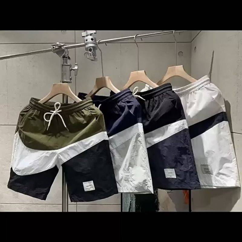 Summer pants pants men's trendy casual beach pants loose color and color cotton large size running sports shorts workers