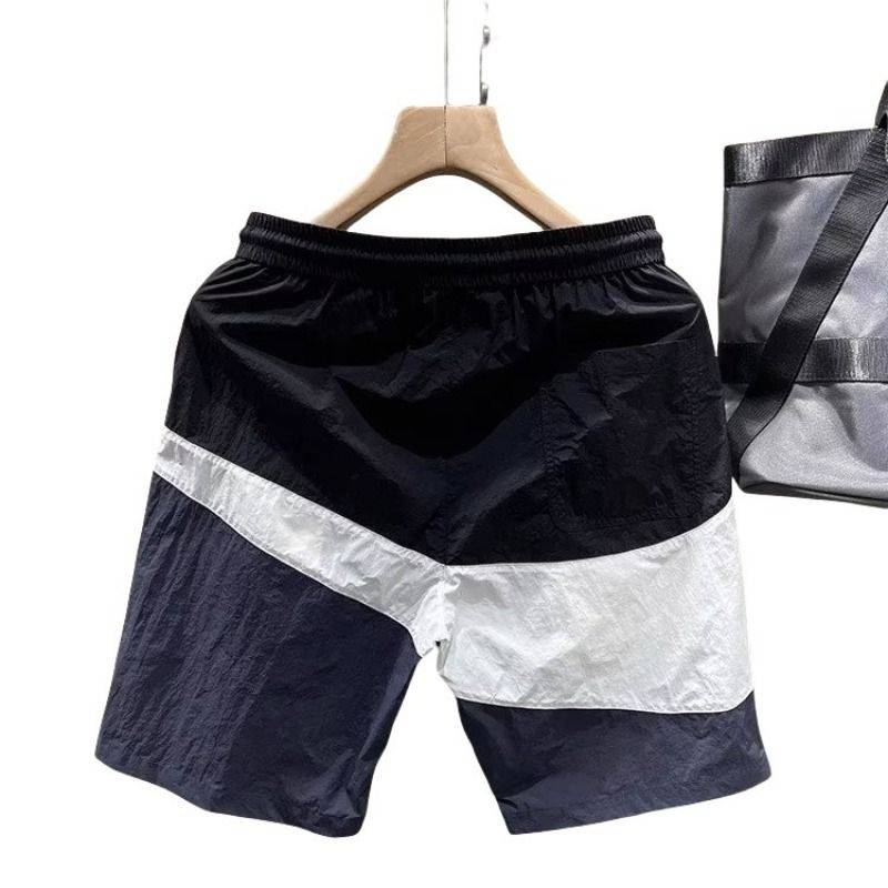 Summer pants pants men's trendy casual beach pants loose color and color cotton large size running sports shorts workers