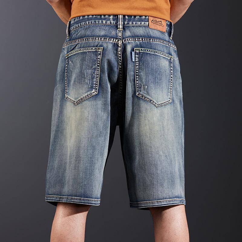 Guo Chao Large Denim in the pants men's puzzle five -point pants koi embroidery half -trousers elastic beggar casual horse pants