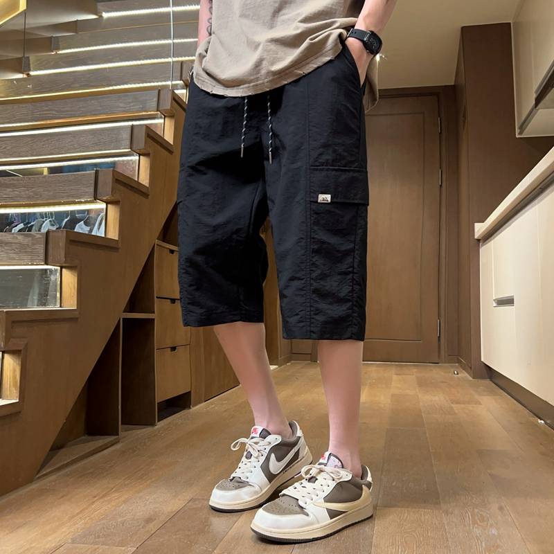 Seven -point pants men's clothing summer youth thin loose casual short pants Speed horse pants cooling ice silk sports pants