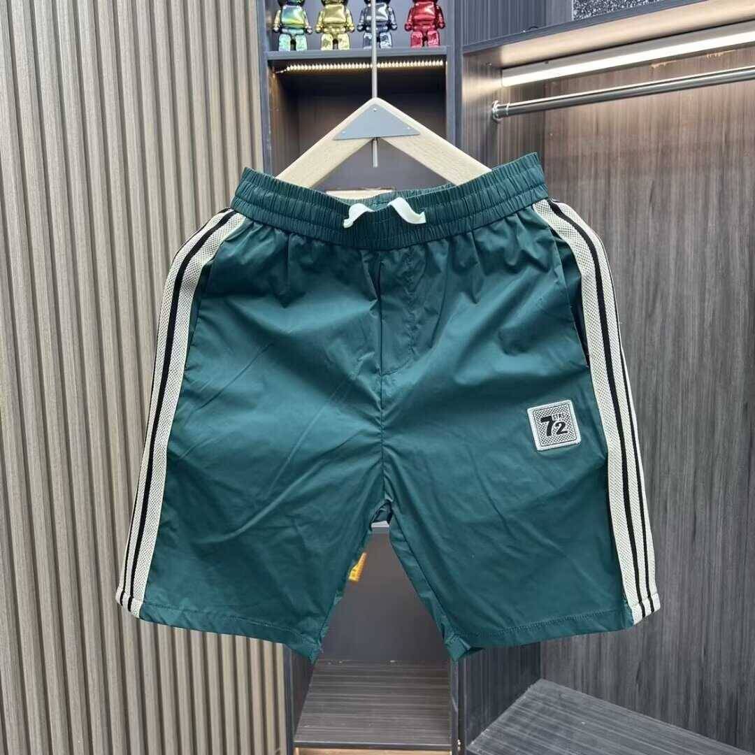 Men's 2024 summer ice silk casual tide stitching campaign quarter -point horse pants trend wild beach pants
