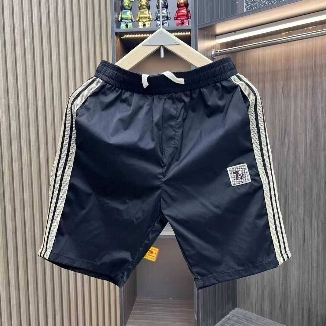 Men's 2024 summer ice silk casual tide stitching campaign quarter -point horse pants trend wild beach pants
