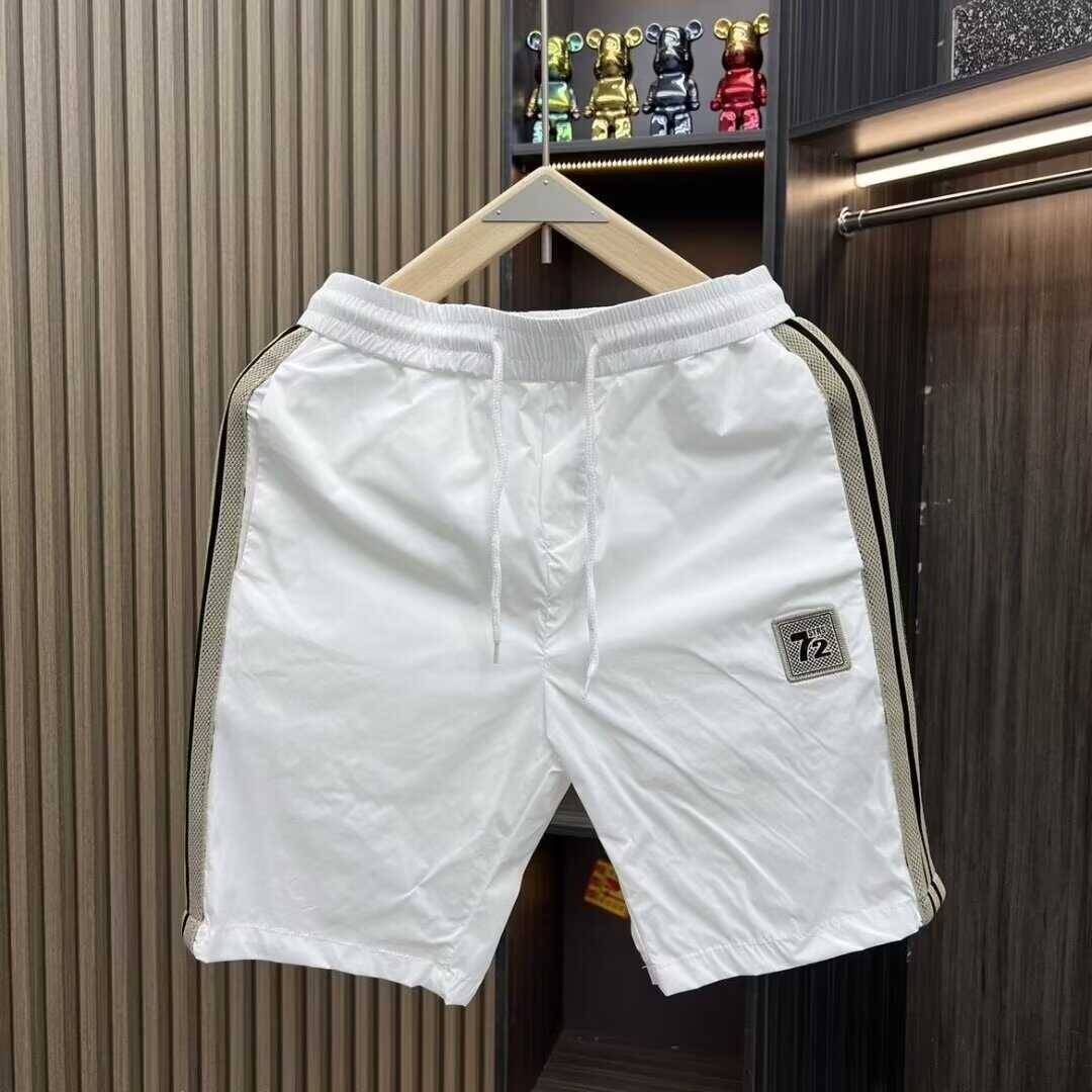 Men's 2024 summer ice silk casual tide stitching campaign quarter -point horse pants trend wild beach pants