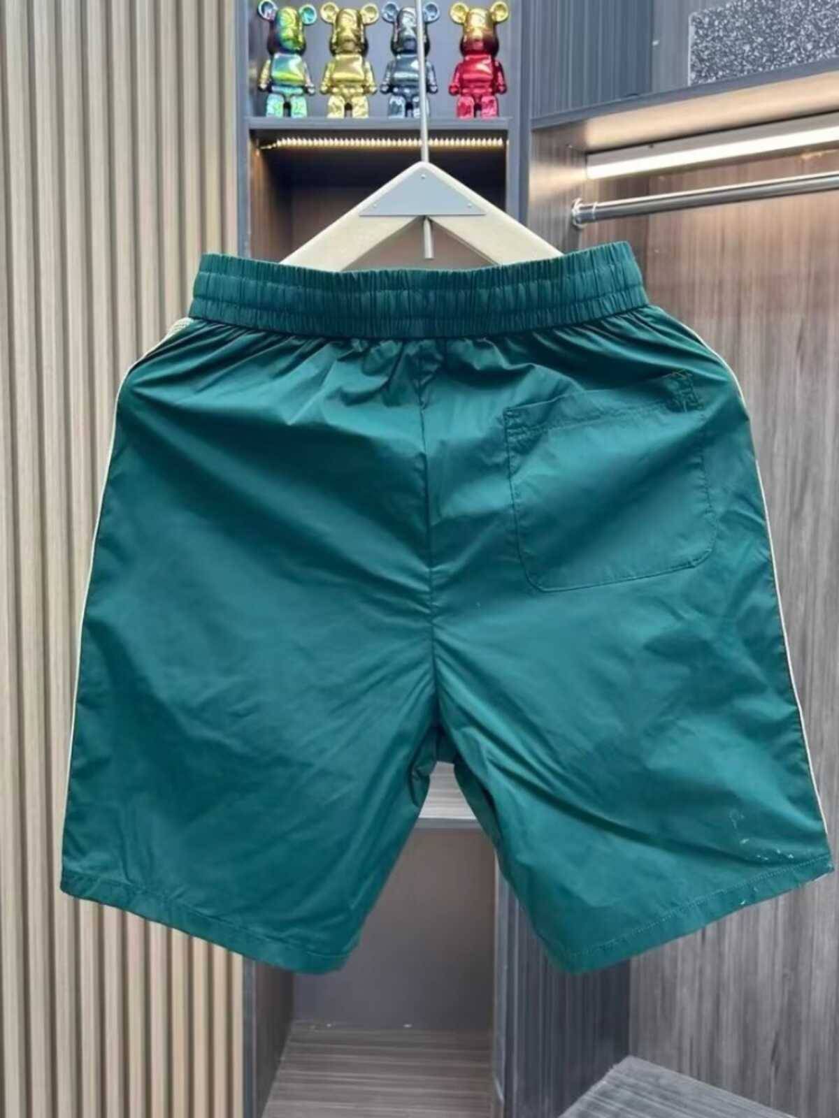 Men's 2024 summer ice silk casual tide stitching campaign quarter -point horse pants trend wild beach pants