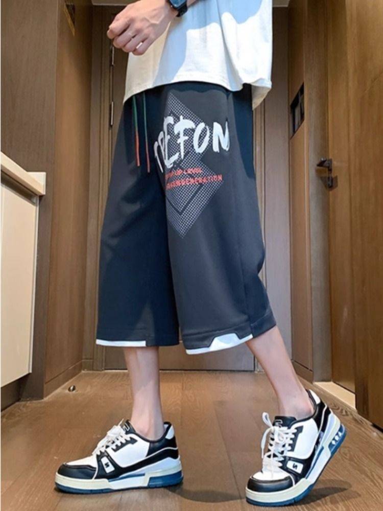 American leisure sports cropped pants men's summer new loose straight tube pants pants tide big size ice silk shorts