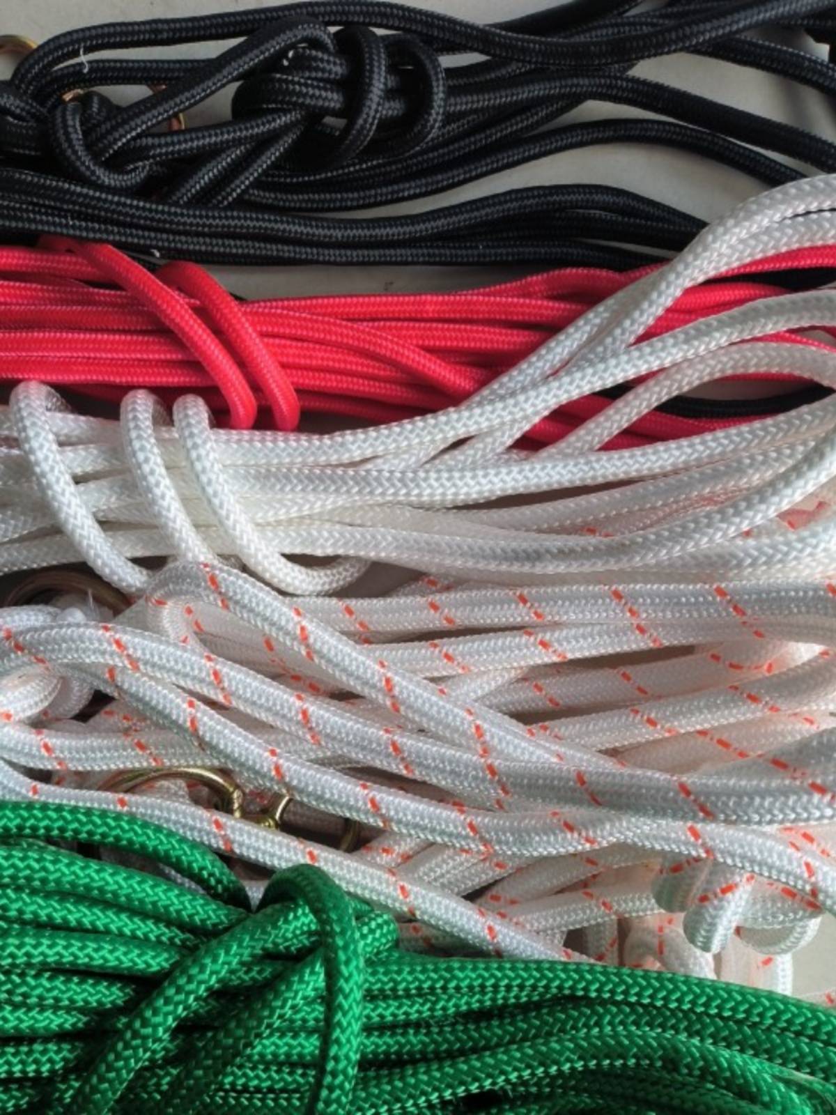 The rope used to tie the cow rope to make the rope red white black green rope brake rope bundle rope woven rope