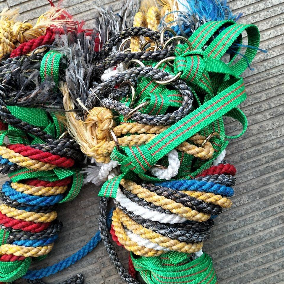 Cows, green with steel ropes