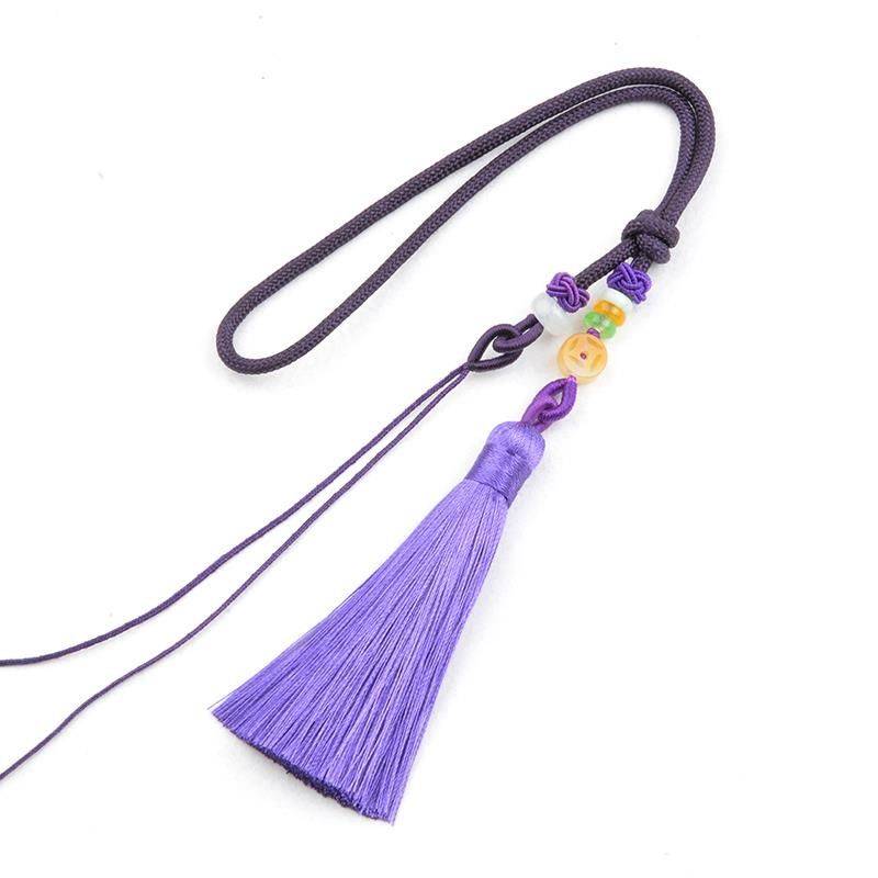 The purple hand-held neck of a leash