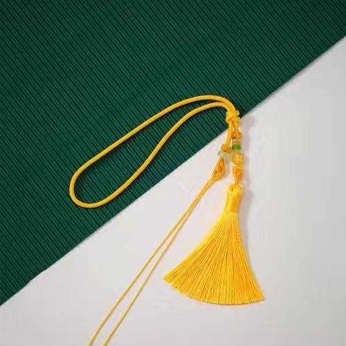 Gold and yellow hand-held leash