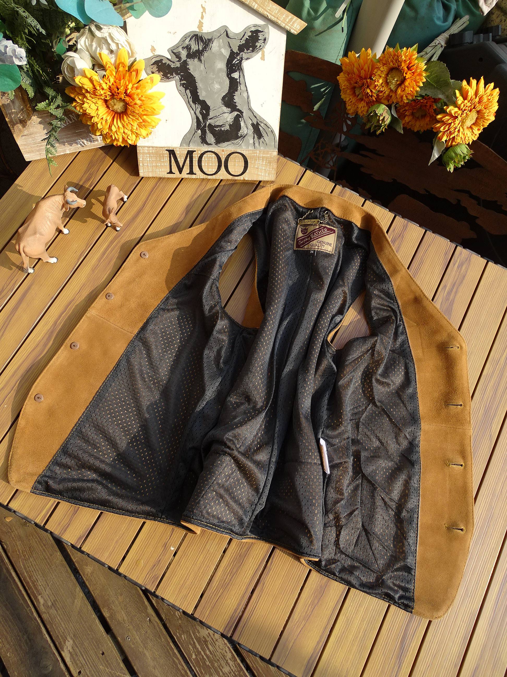 I'll sell it! A man in a leather coat with a flair and a stale hand