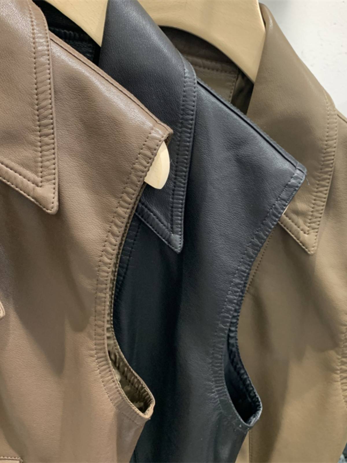 European cargo V -neck large lapel short leather horses clip female spring and autumn design sense sleeveless zipper PU leather niche horses