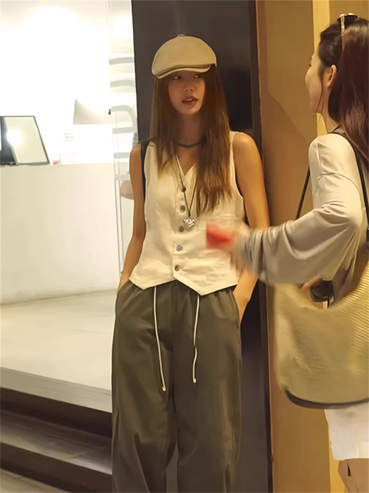 Old Qianfeng V -neck single -breasted horse clip female summer new design sense niche wearing vest vest sleeveless tops