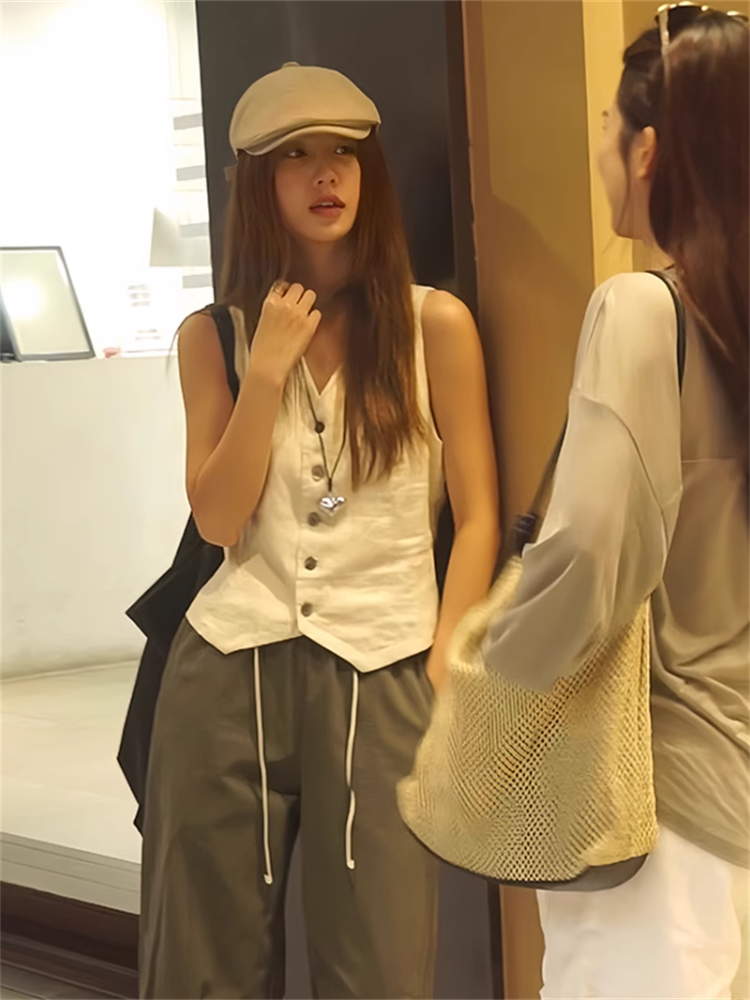Old Qianfeng V -neck single -breasted horse clip female summer new design sense niche wearing vest vest sleeveless tops