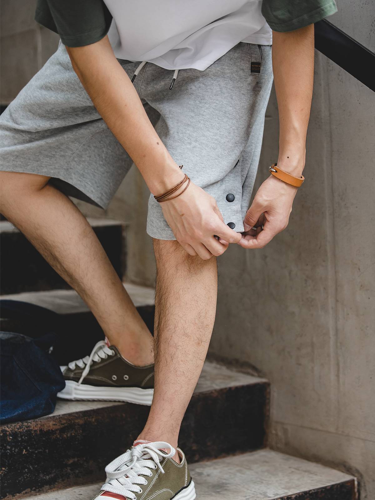 Madden's U.S.R.R.K. shorts, buttons, five-minutes