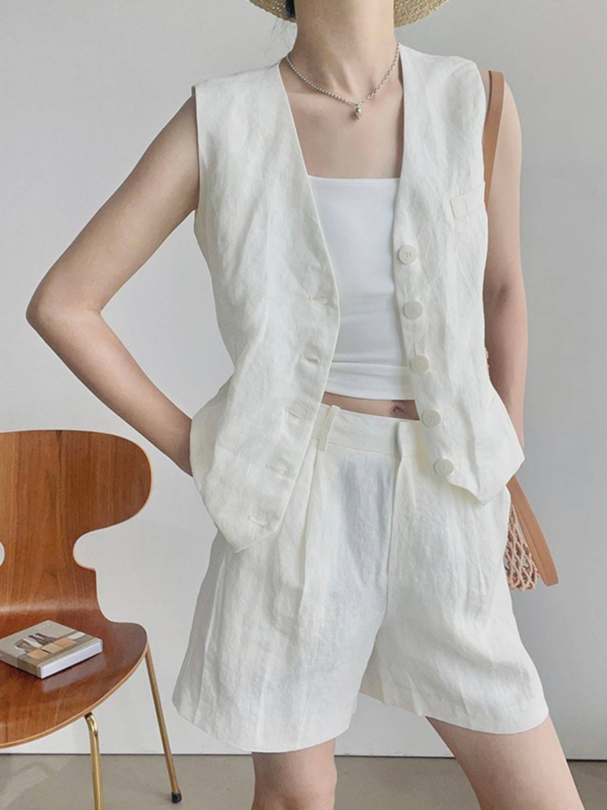 Cotton and linen white suit vest female Xia Ou goods lightly stacked V -neck linen sleeveless shoulder coat top