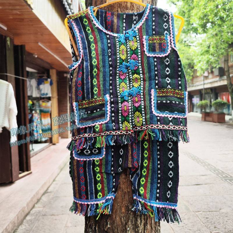 The new ethnic minority children's round collar cotton and linen vest into the people's style of the people's ethnic and the shoulders medium and small children neutral vests