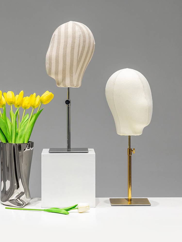 Clothing store bubble pins, cloth head molds showing the men's and women's wig jewelry hat storage cap