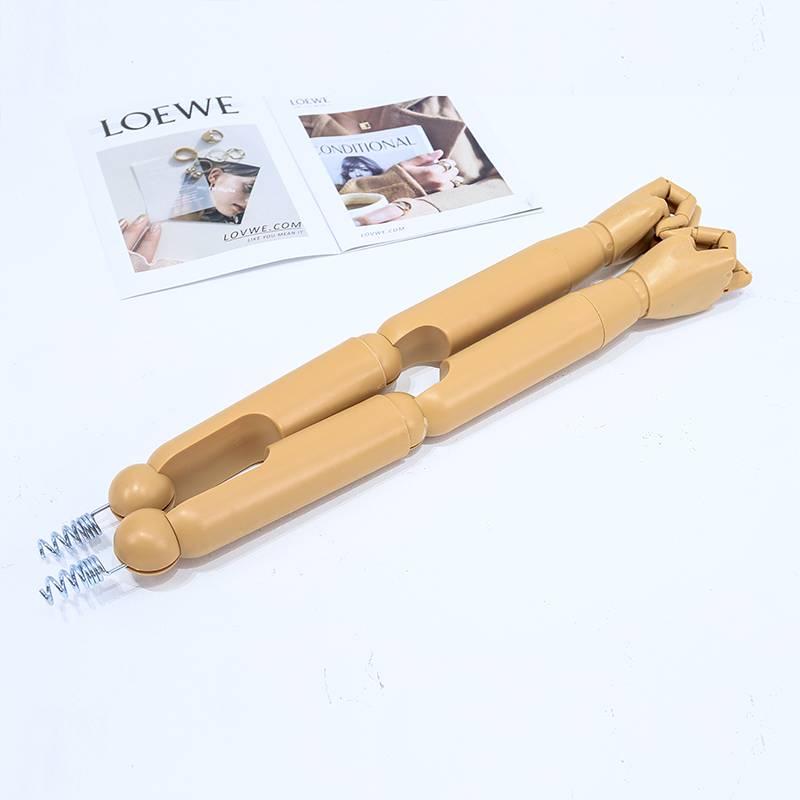 A grown man's spring-wood plastic hand