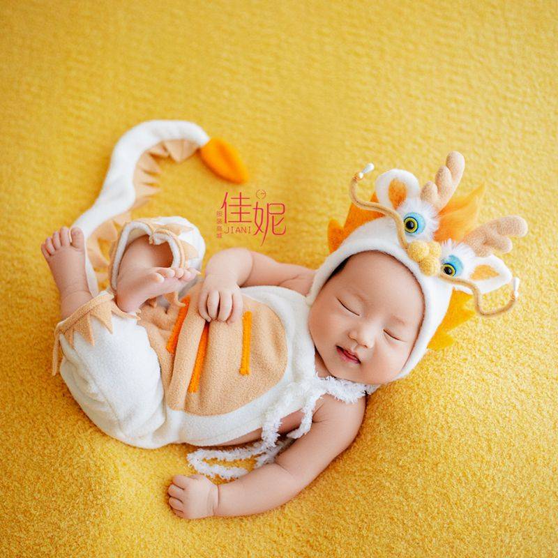 It's a 100-day feature of the Dragon Baby's photo costume