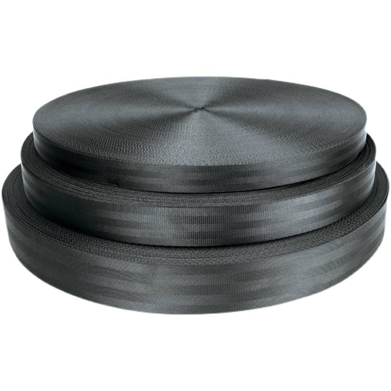 The truck's black seatbelt strapped to the plane with a thick grinder-resistant brake rope and a nylon
