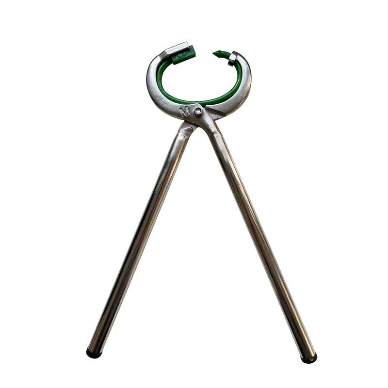 Metal stainless steel cow nose pliers with thick cow nose rings and ox's nose tugs and piercing