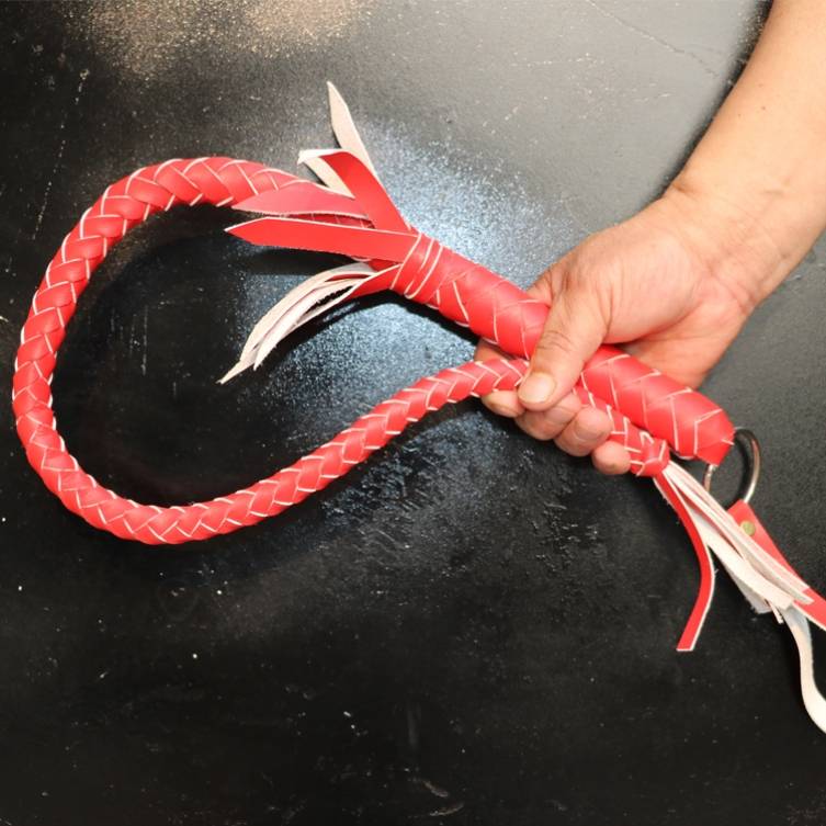 One metre of red, pure cow-skin whips