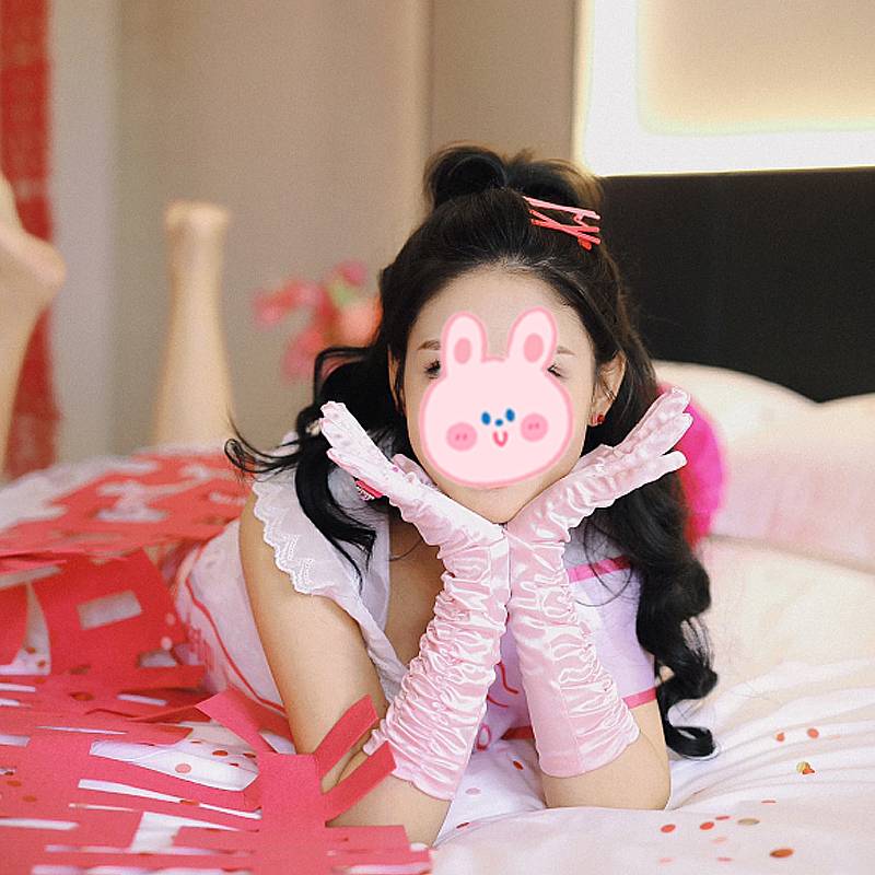 A pair of pink gloves