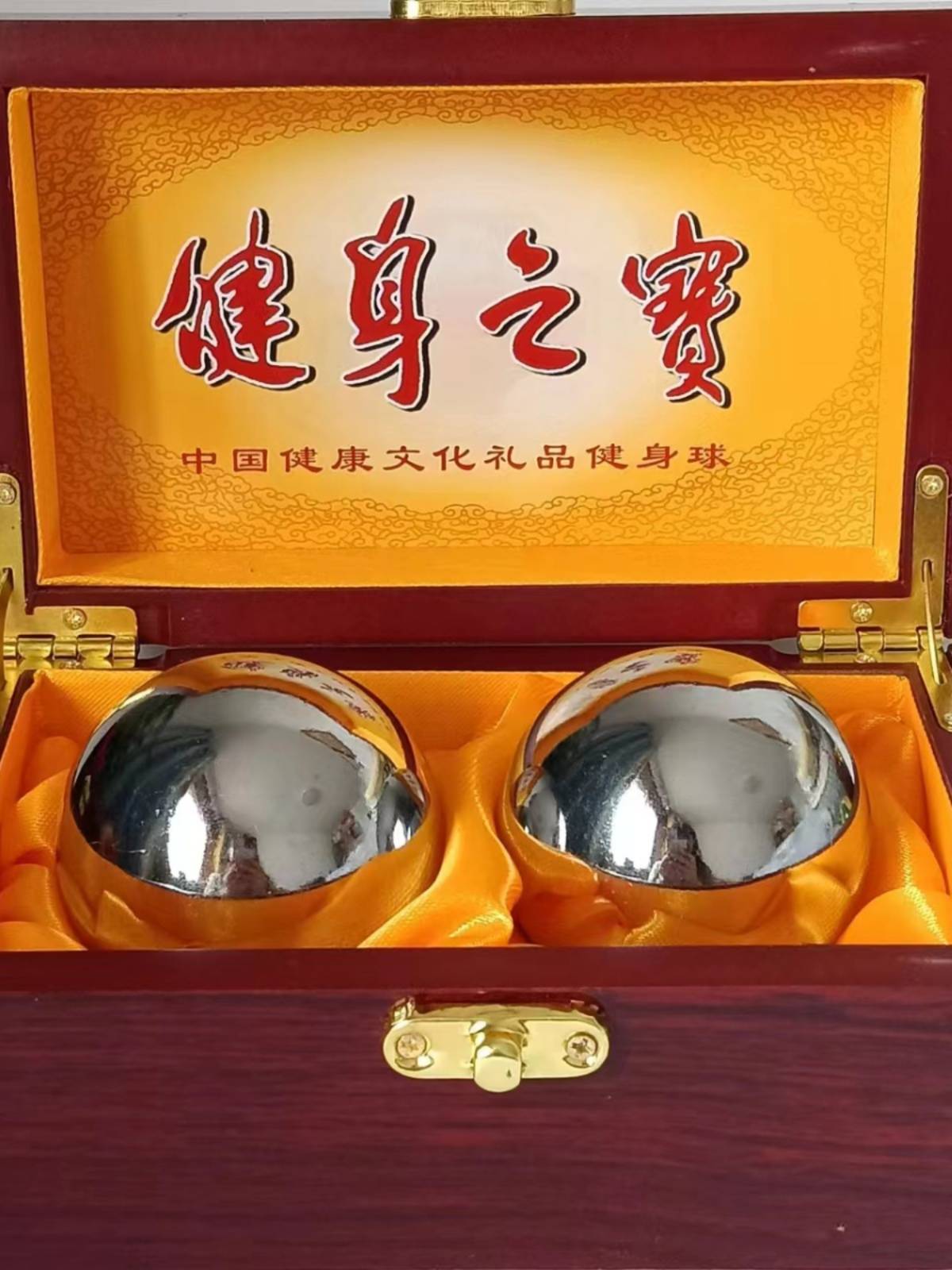 304 stainless steel hollow bell ringing Baozing iron ball fitness ball in the middle and elderly health ball handball holding the rehabilitation massage