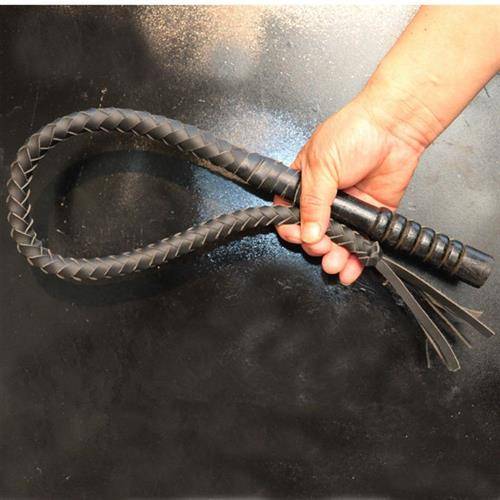 One metre of black, pure oxen lashes, wooden handle