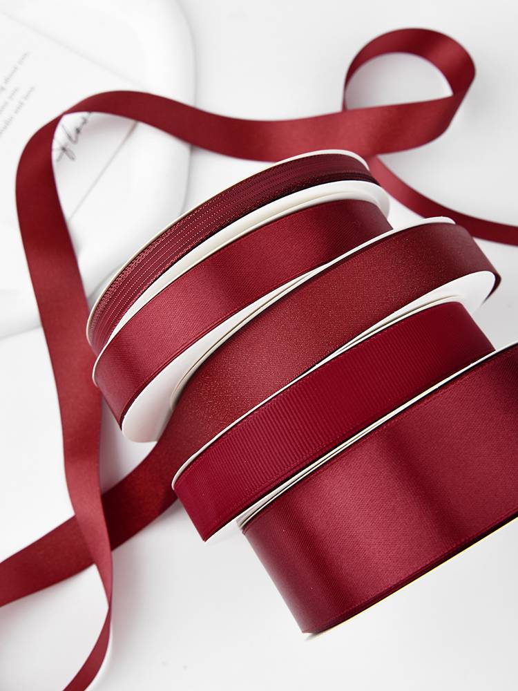 wine and red ribbons and dialysed ribbons for marriage
