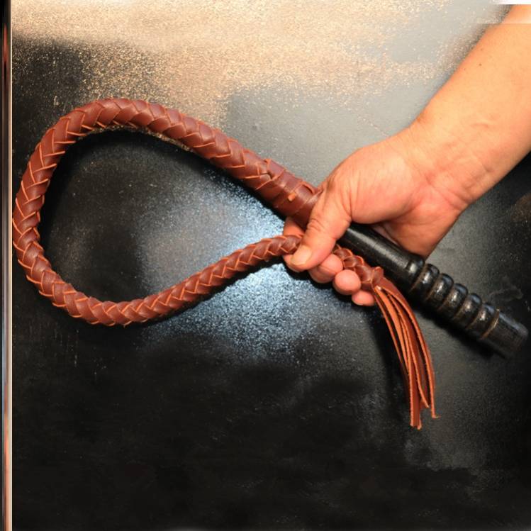 80 centimeters of brown, pure oxen-skin, wood handle