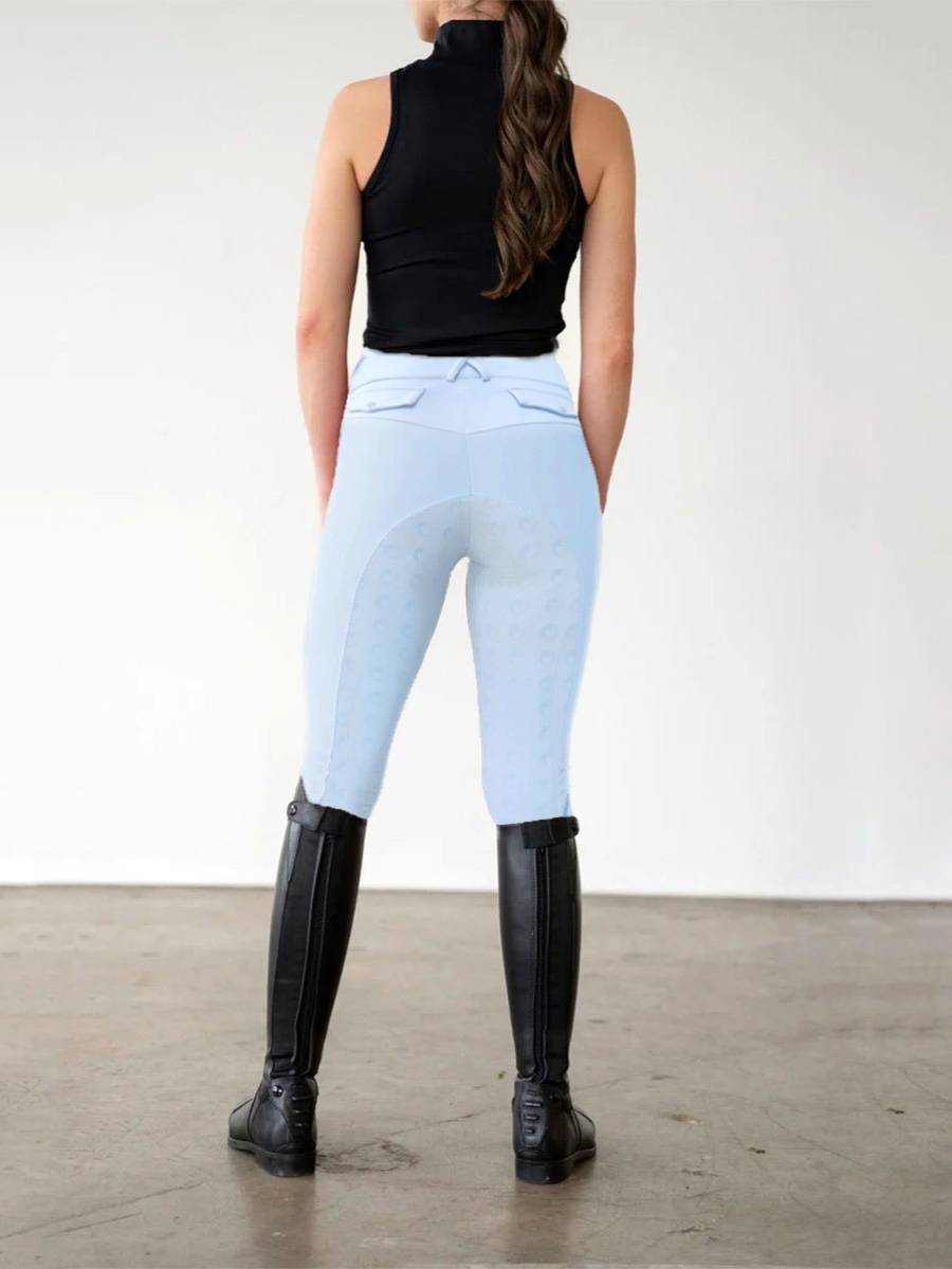 Female equestrian trousers with side pockets, anti -slip silicone quicks dry light blue front zipper riding clothes