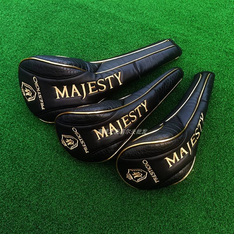 A GOLF CLUB, A HOOD, A MARJESTY POLE, A PUSH STICK, A MAGNET