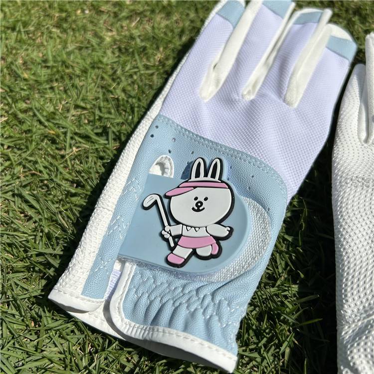 ms. golf gloves with her fingernails on her finger