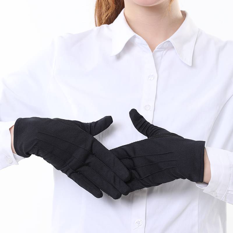 Black-and-white gel-proof taxi driver with ceremonial protocol gloves