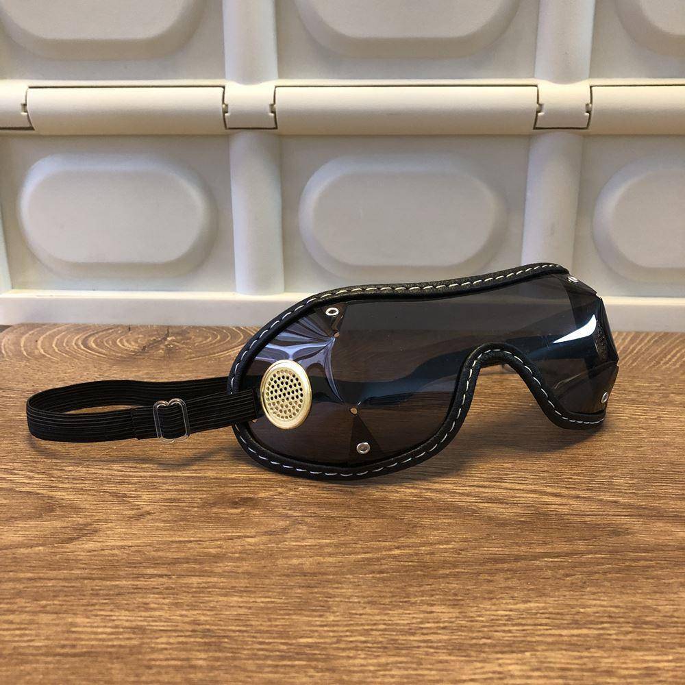Rymor jumps on horseback, wind-scrap helmet, sunscreen protection, big glasses