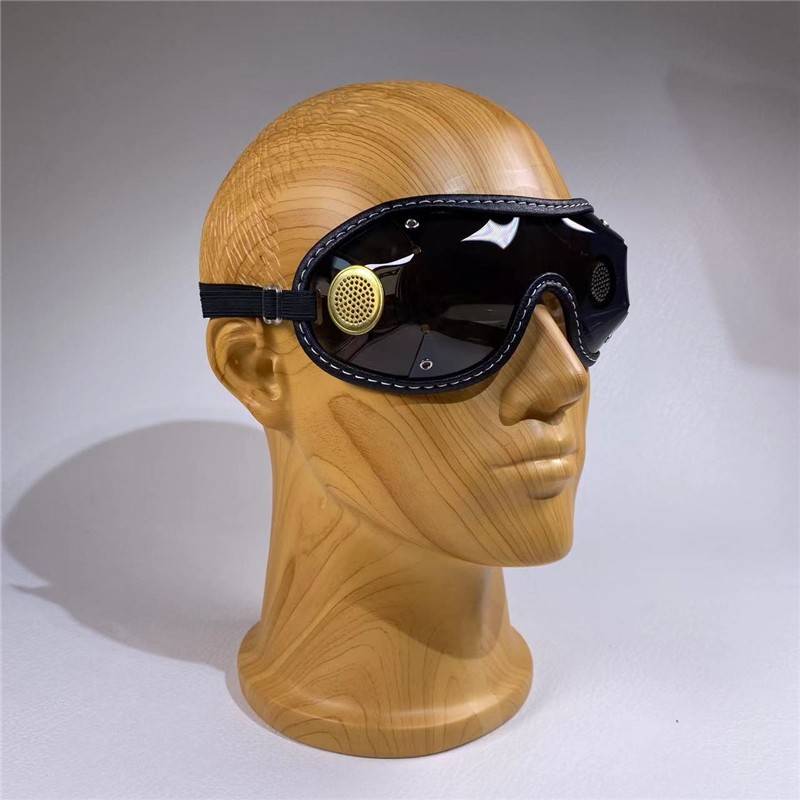 Rymor jumps on horseback, wind-scrap helmet, sunscreen protection, big glasses