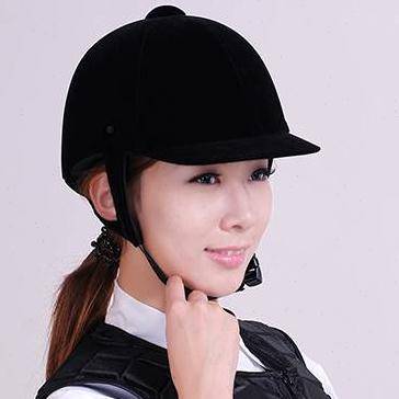 A horse's kit rides a horse's helmet, a man's and a woman's horse's hat, a black-coded polo hat