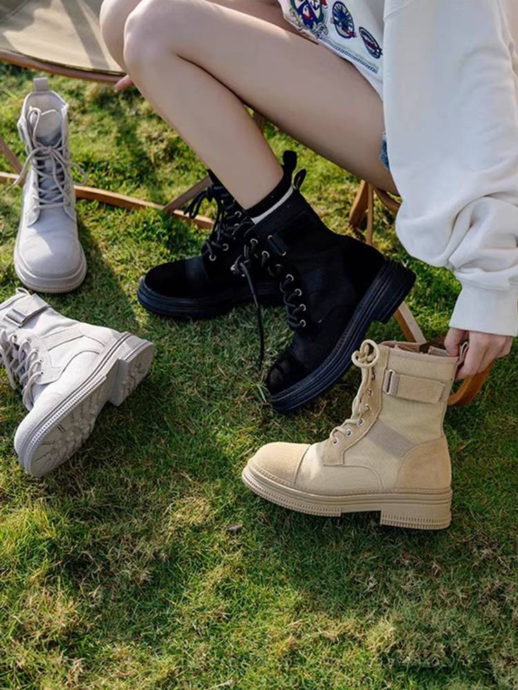 Hong Kong's Martin Boots Girl in Xinjiang Tibet travels on savannah shorts in the desert
