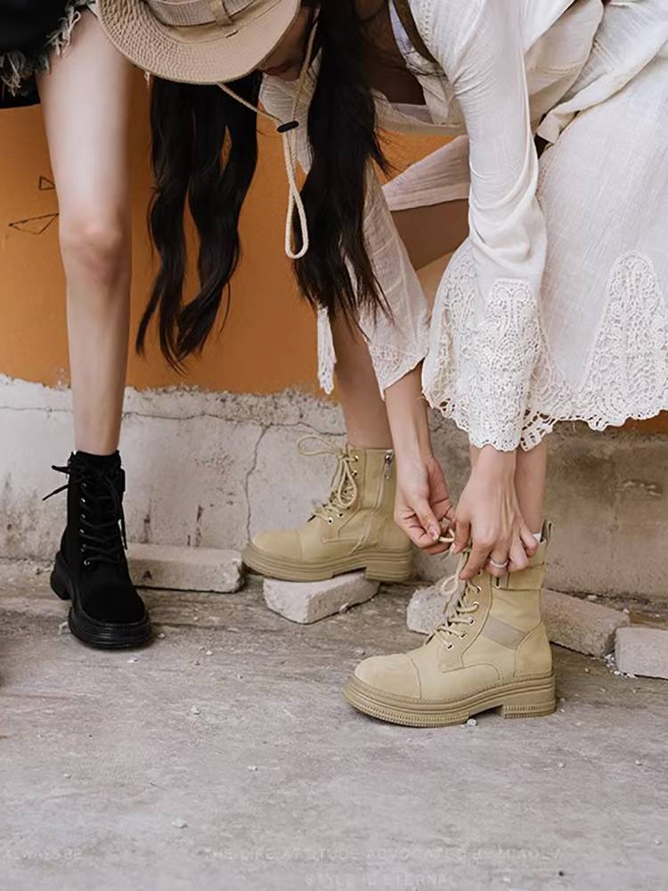 Hong Kong's Martin Boots Girl in Xinjiang Tibet travels on savannah shorts in the desert