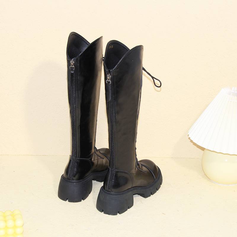 black highs and long boots with high straps