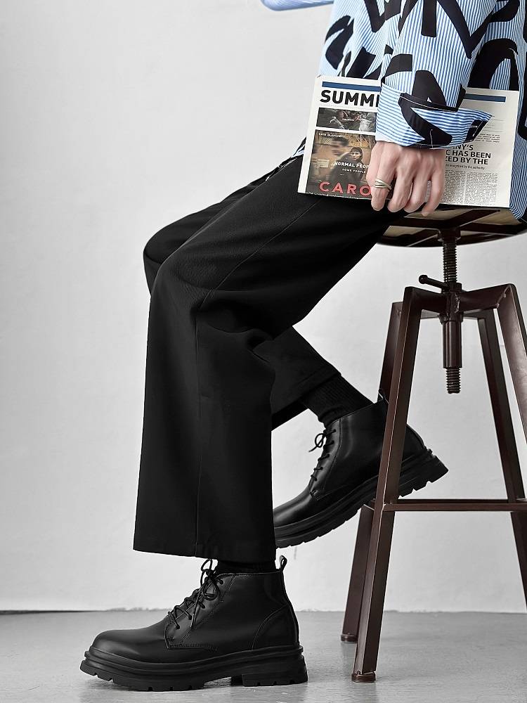 Martin Boots Boy, a black-and-black-haired man with a good sense of business commuting