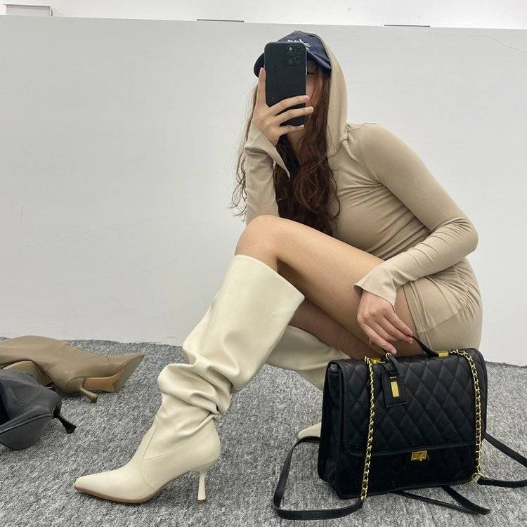 The hot chicks, the big boot, the new 2024, and the thin pile of boots over the knee