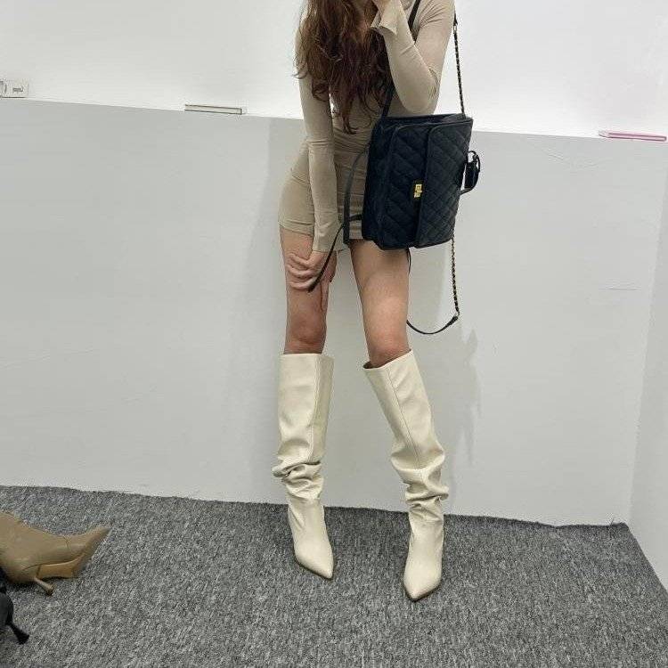 The hot chicks, the big boot, the new 2024, and the thin pile of boots over the knee